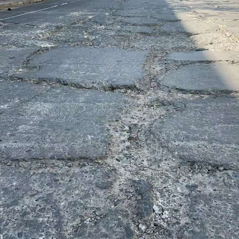 北道路面起砂露石子修补料